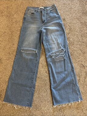 Light Blue Distressed Wide-Leg Jeans - High-Rise Flare
